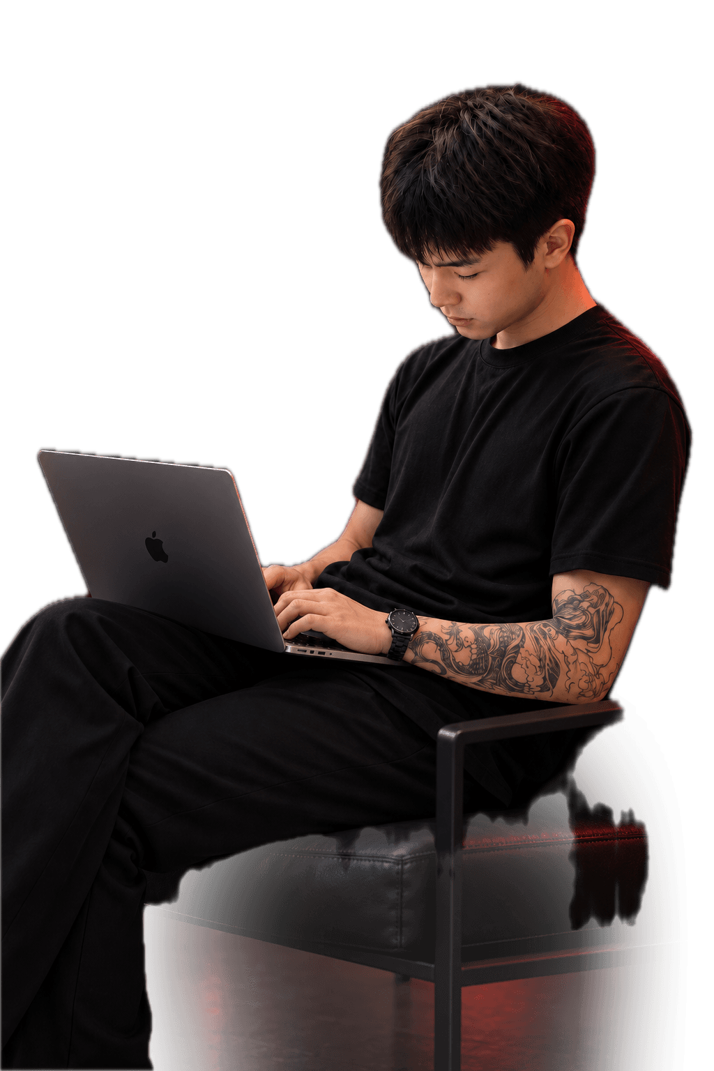 Batsaikhan working on a laptop